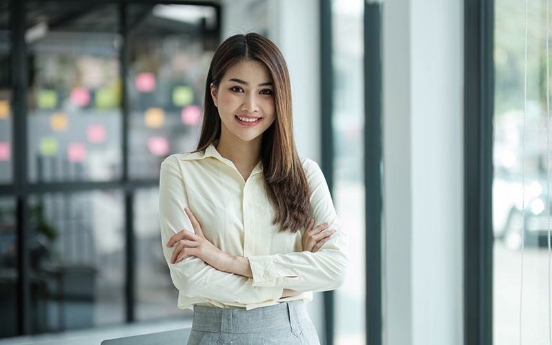 Human resource professional smiling at the office.