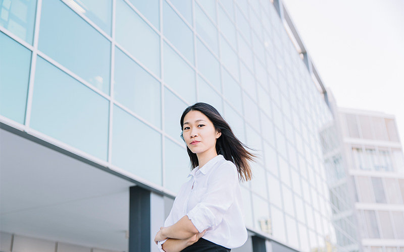 Confident young professional embodying key characteristics of an entrepreneur